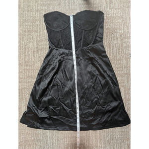 black strapless dress with a lace bustier top and a satin-finish skirt size M